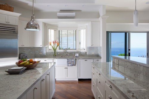 River White Granite Countertop, Island Top, Raised Breakfast Bar with White Cabinets, Stained Mosaic Glass Tile and Diagonal Set Up Cumaru Flooring.